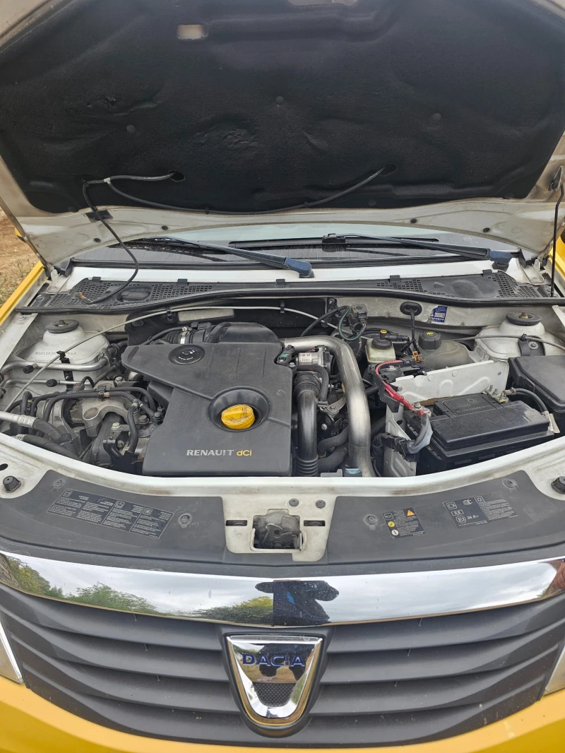 Dacia Logan, снимка 9 - Автомобили и джипове - 52409795