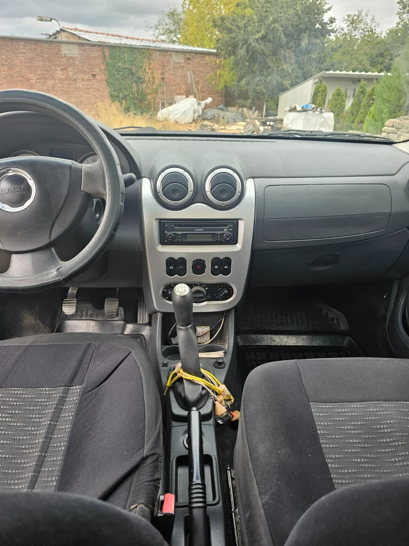 Dacia Logan, снимка 8 - Автомобили и джипове - 52409795