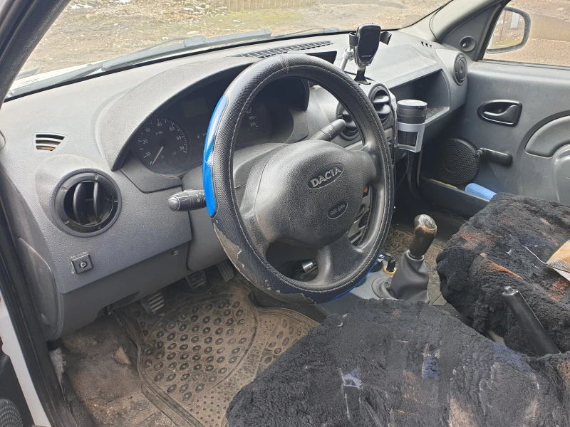 Dacia Logan, снимка 4 - Автомобили и джипове - 52736528