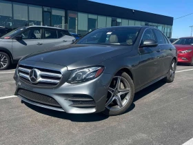 ������ Mercedes-Benz E 400
