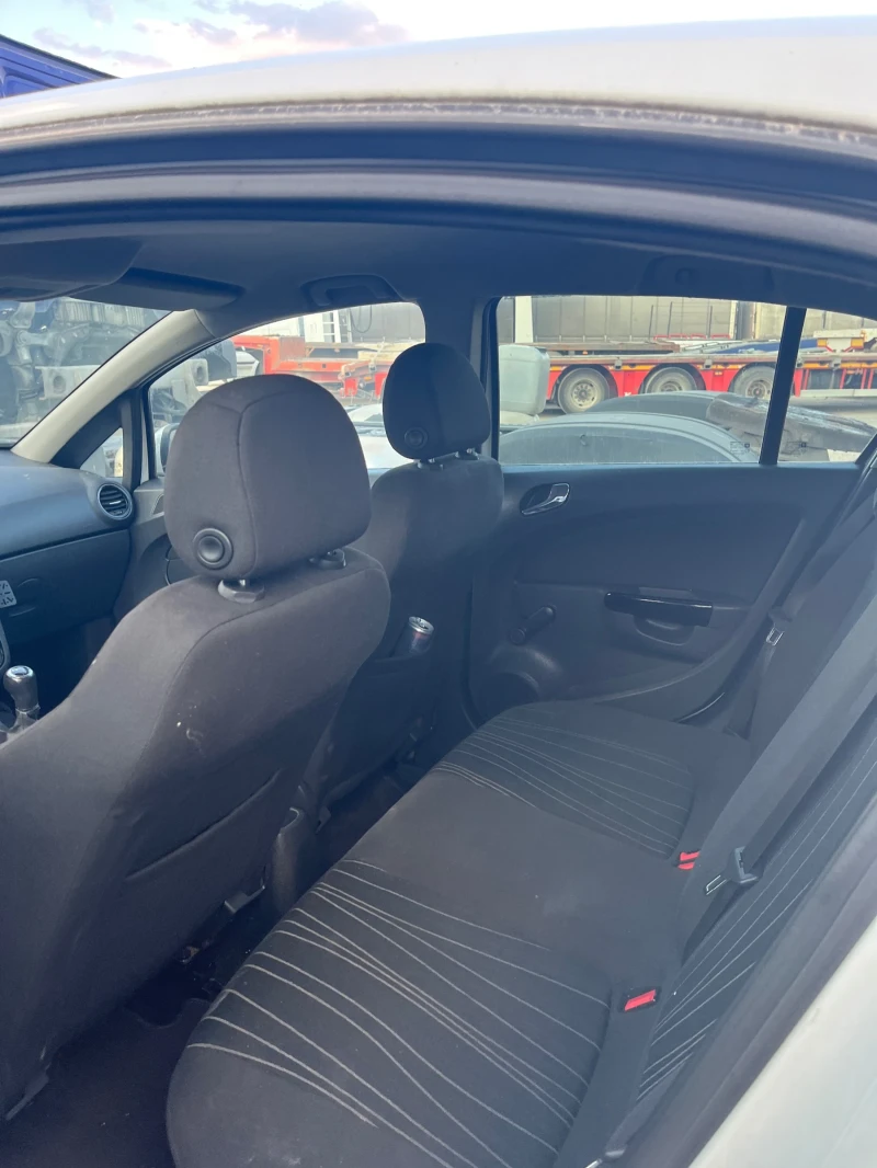 Opel Corsa 1.0i ЦЯЛА ЗДРАВА КОЛА , снимка 3 - Автомобили и джипове - 51442938