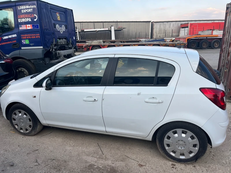 Opel Corsa 1.0i ЦЯЛА ЗДРАВА КОЛА , снимка 2 - Автомобили и джипове - 51442938