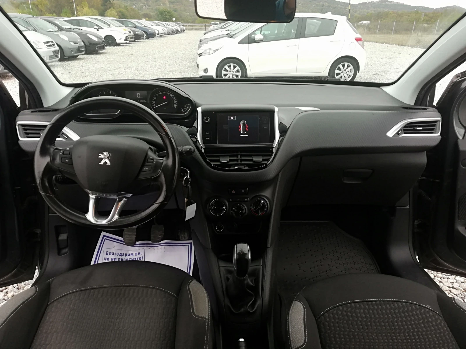Peugeot 208 1.2i klima, снимка 10 - Автомобили и джипове - 56724301