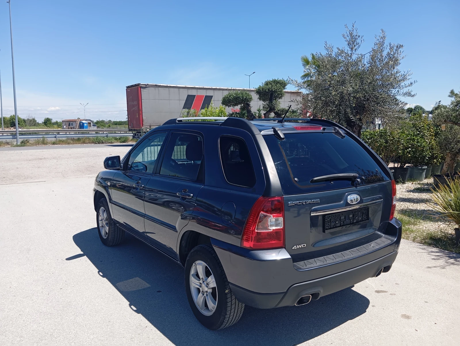 Kia Sportage Газ-бензин, снимка 5 - Автомобили и джипове - 54551936