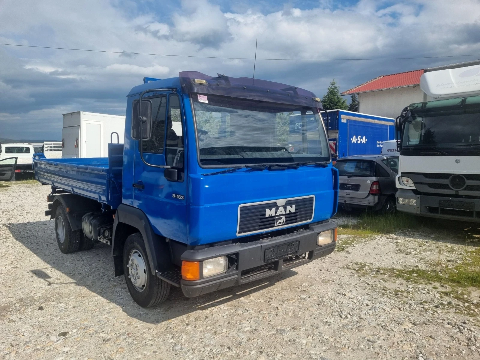 Man 8.163 самосвал - изображение 6