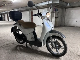 Piaggio Scarabeo Apprilia 100 куб, снимка 1