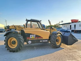 Телескопичен товарач Caterpillar Тн220В, снимка 3