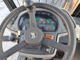 Телескопичен товарач Caterpillar Тн220В, снимка 6