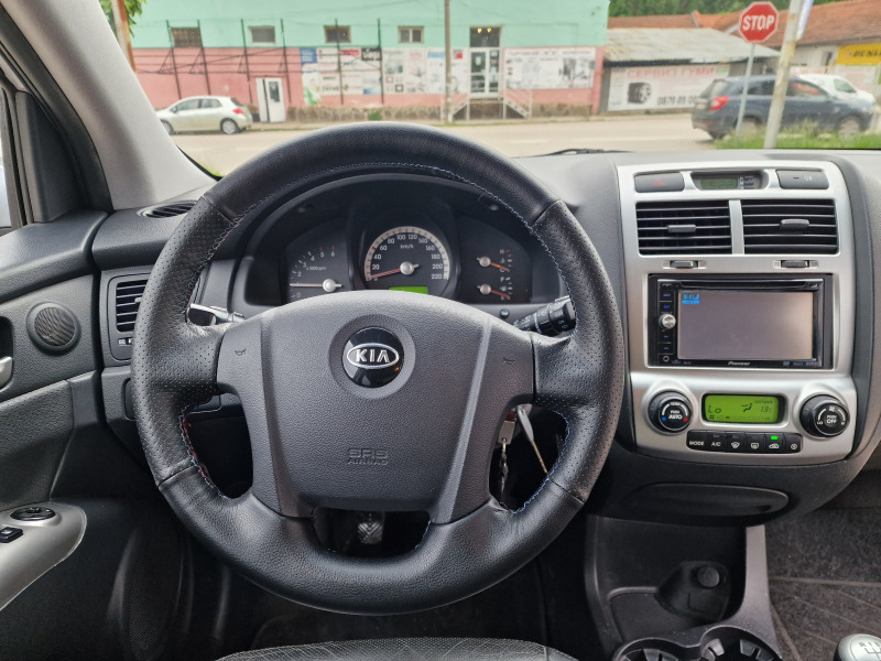 Kia Sportage, снимка 7 - Автомобили и джипове - 46318196