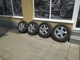 Гуми с джанти GoldenTyre 245/65R17, снимка 1