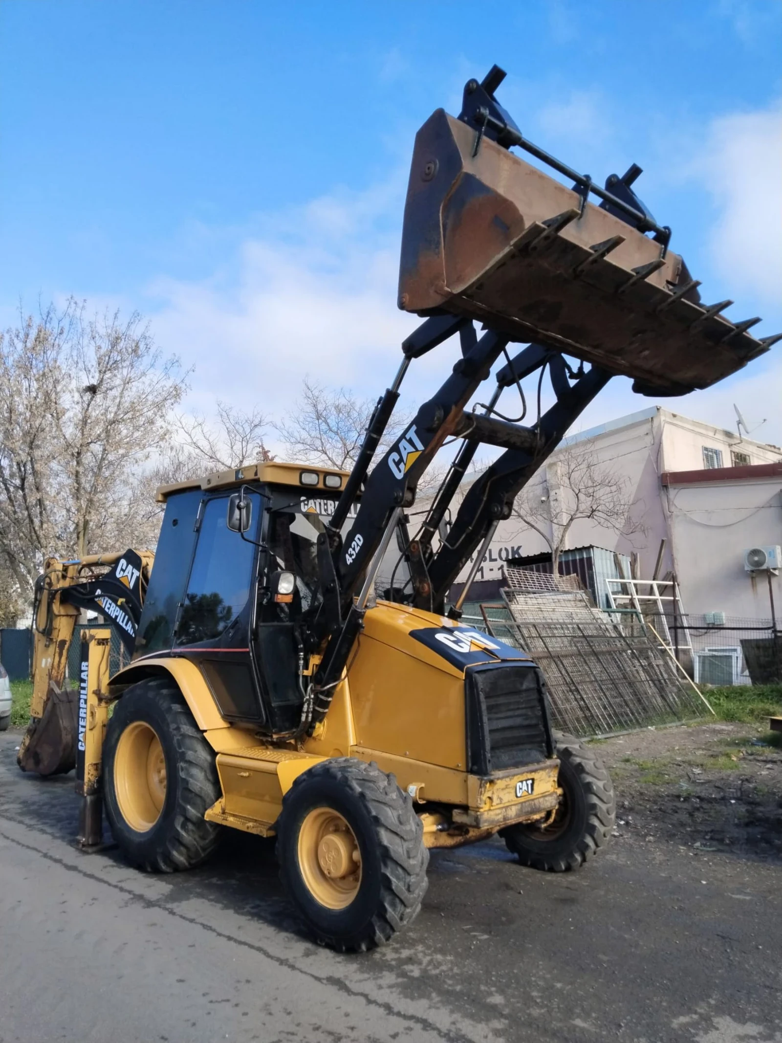 Багер Caterpillar 432D