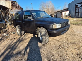 Opel Frontera 2.0i 1