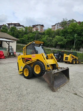 Мини челни товарачи Komatsu sk07 затворан с парно Нов внос, снимка 12