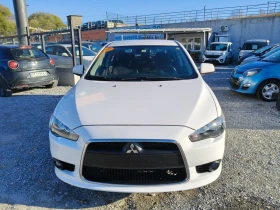 Mitsubishi Lancer 1.5i, снимка 1