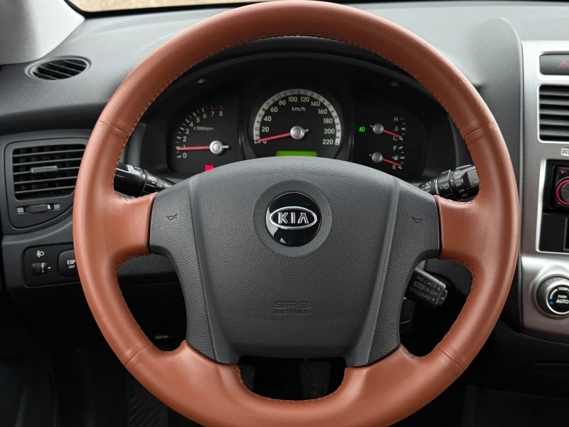 Kia Sportage 2.0i* 4x4* Кожа, снимка 12 - Автомобили и джипове - 53261956