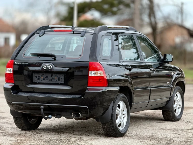 Kia Sportage 2.0i* 4x4* Кожа, снимка 7 - Автомобили и джипове - 53261956