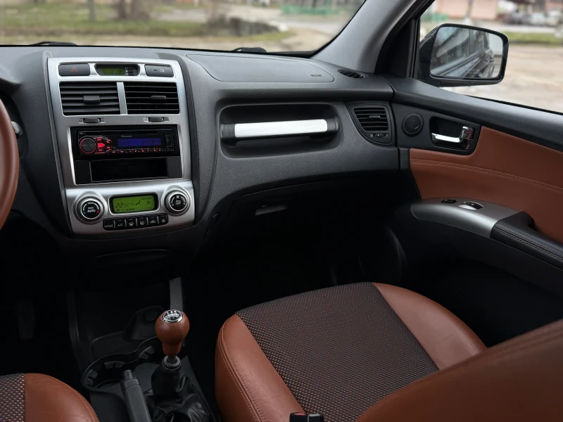 Kia Sportage 2.0i* 4x4* Кожа, снимка 10 - Автомобили и джипове - 53261956