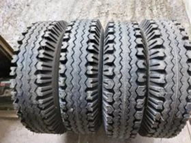      215/90R15