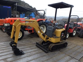 Багер Cat 008CR, снимка 1