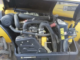 Телескопичен товарач JCB 536-70, снимка 14