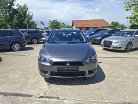 ������ Mitsubishi Lancer