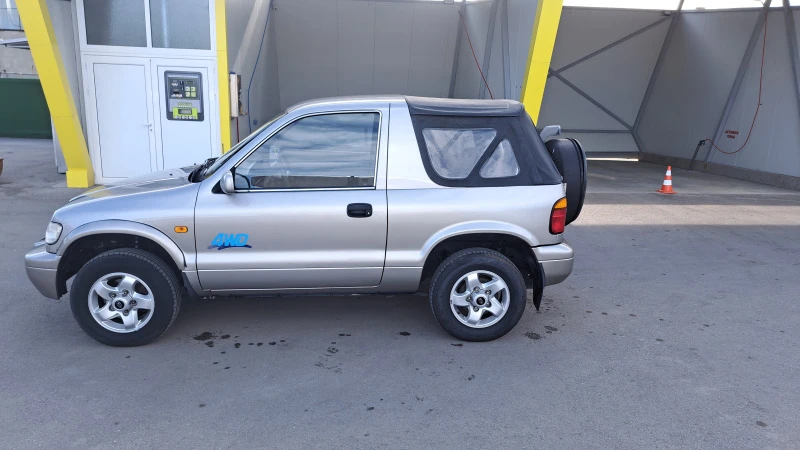 Kia Sportage 2.0, снимка 7 - Автомобили и джипове - 47059347