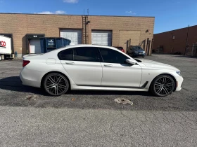 BMW 750 * * CARFAX * * АВТО КРЕДИТ * *  - 22999 € / 44982.13 лв. - 31807753 4