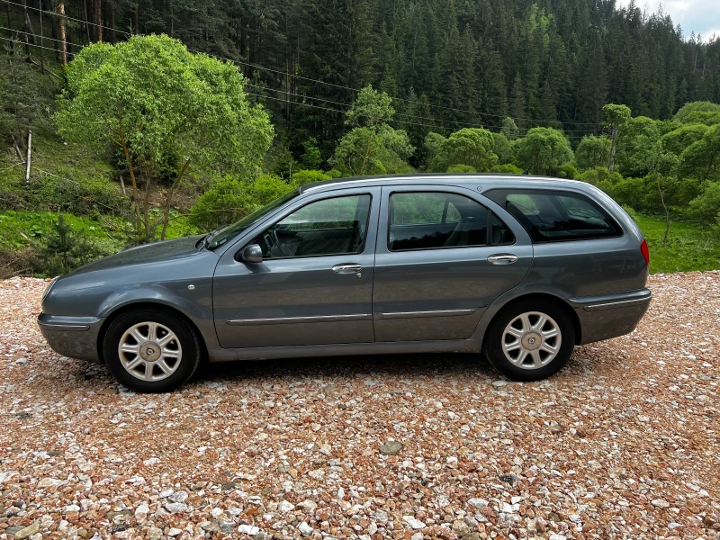 Lancia Lybra 1.9JTD* BOSE* ОБСЛУЖЕНА* МНОГО СТЕГНАТА* ДОБРИ ГУМ, снимка 5 - Автомобили и джипове - 50579271