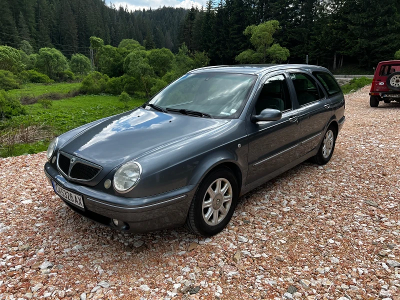Lancia Lybra 1.9JTD* BOSE* ОБСЛУЖЕНА* МНОГО СТЕГНАТА* ДОБРИ ГУМ, снимка 6 - Автомобили и джипове - 50579271