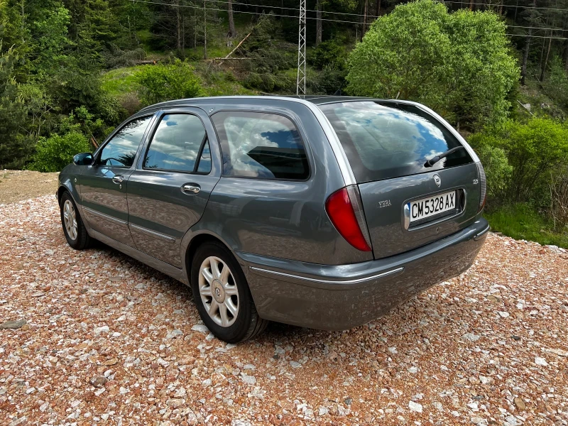 Lancia Lybra 1.9JTD* BOSE* ОБСЛУЖЕНА* МНОГО СТЕГНАТА* ДОБРИ ГУМ, снимка 4 - Автомобили и джипове - 50579271