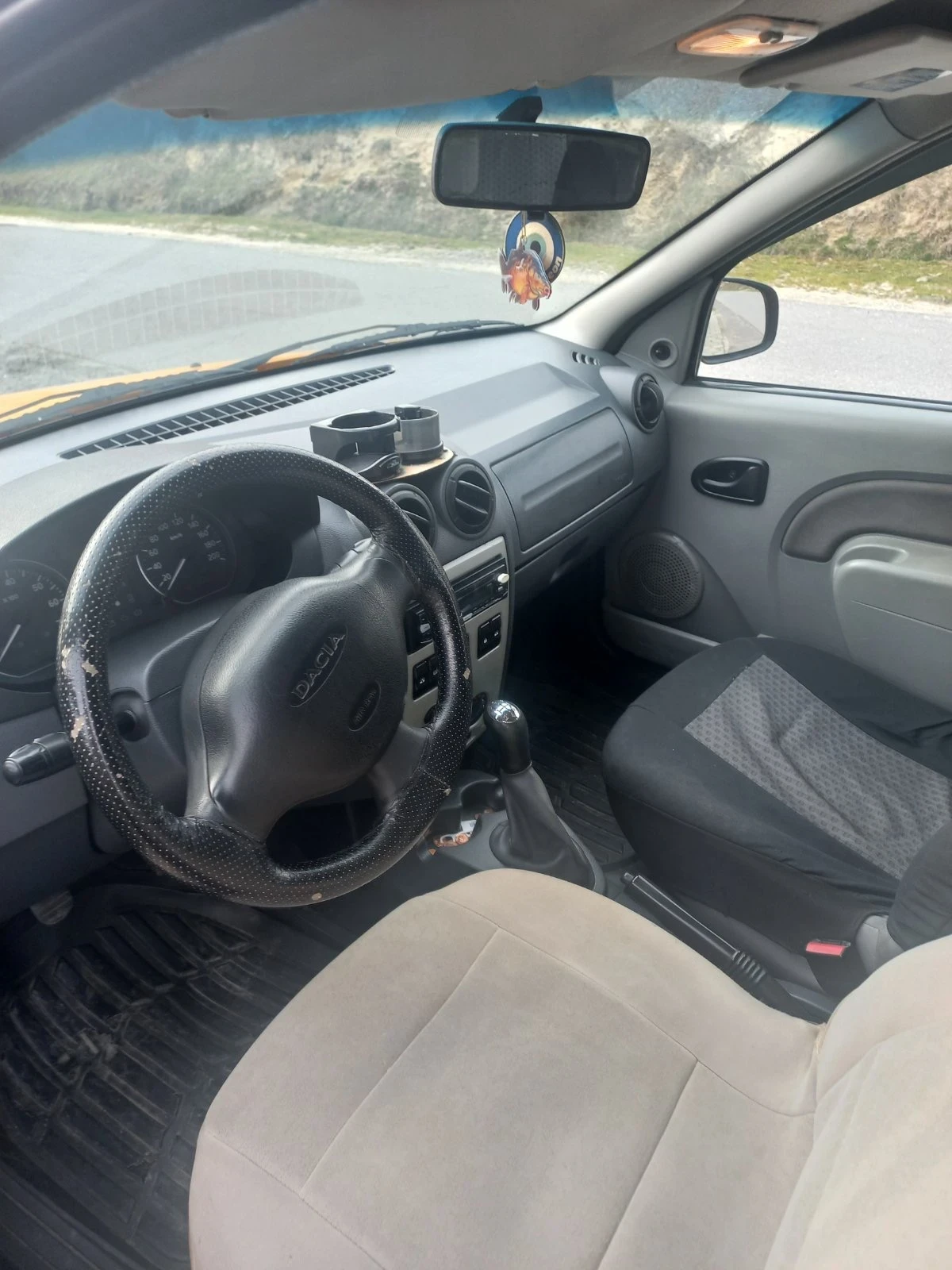 Dacia Logan, снимка 12 - Автомобили и джипове - 53727045