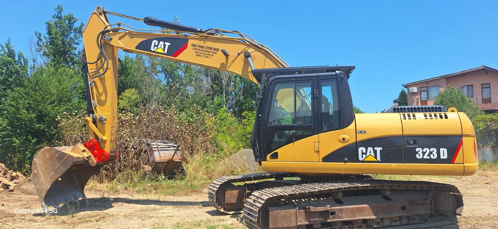 Багер Cat 323D