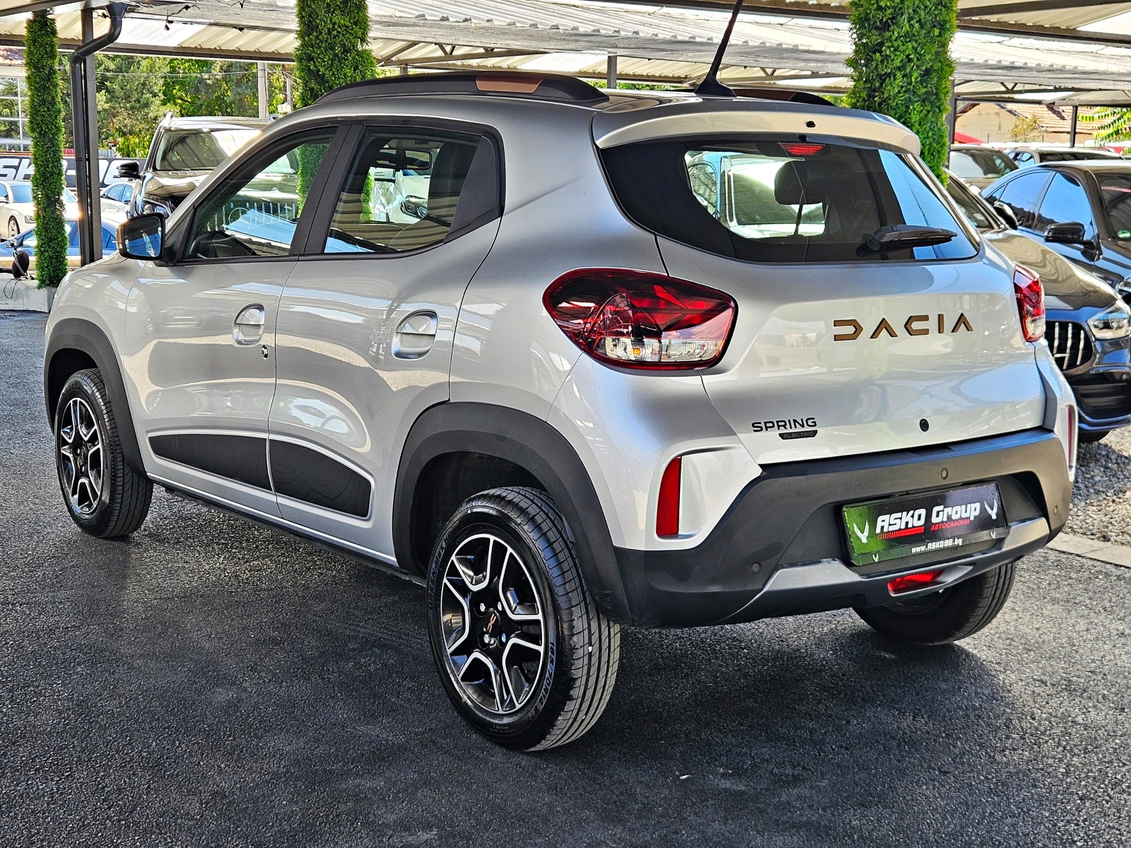 Dacia Spring 65/GERMANY/26.8kWh/CAMERA/ТЕМПОМАТ/NAVI/KОЖА/LIZIN, снимка 7 - Автомобили и джипове - 56112440