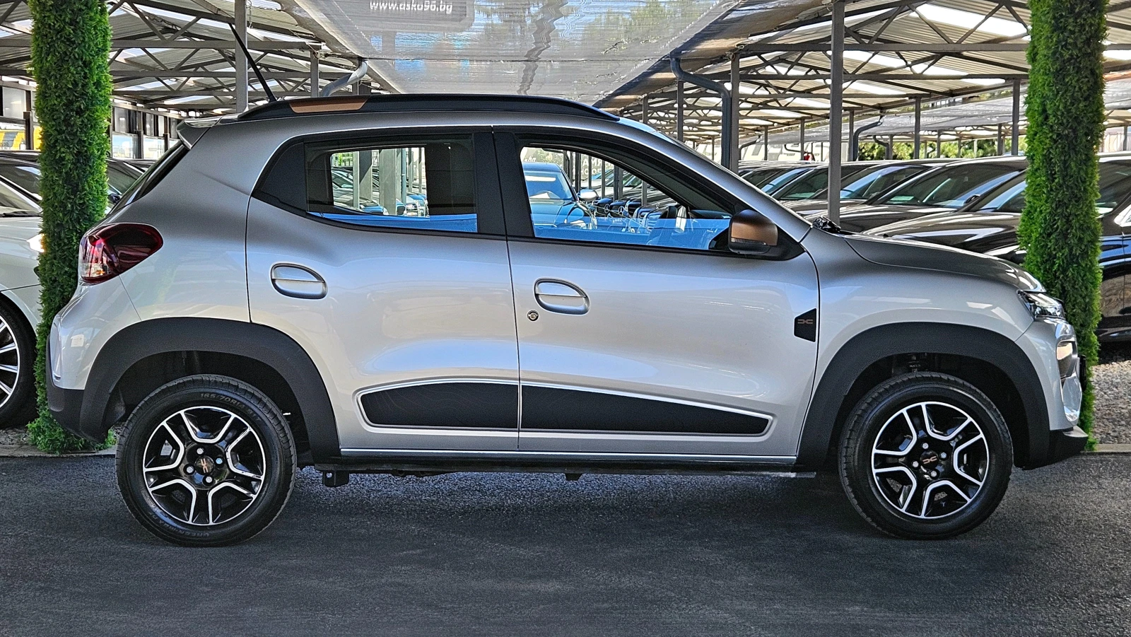 Dacia Spring 65/GERMANY/26.8kWh/CAMERA/ТЕМПОМАТ/NAVI/KОЖА/LIZIN, снимка 4 - Автомобили и джипове - 56112440
