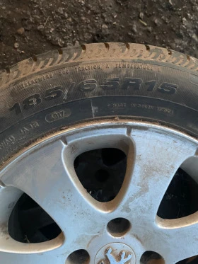        185/65R15  Peugeot