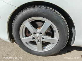 Toyota Auris - 7300 € / 14277.56 лв. - 93869353 11