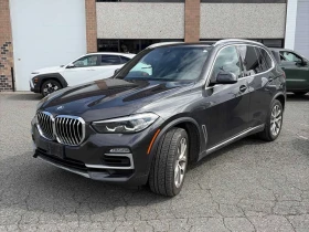 BMW X5 * xDrive40i * ПОДГРЕВИ * ПАНО * 2 КЛЮЧА * CARFAX * - 31500 € / 61608.64 лв. - 94716392 1