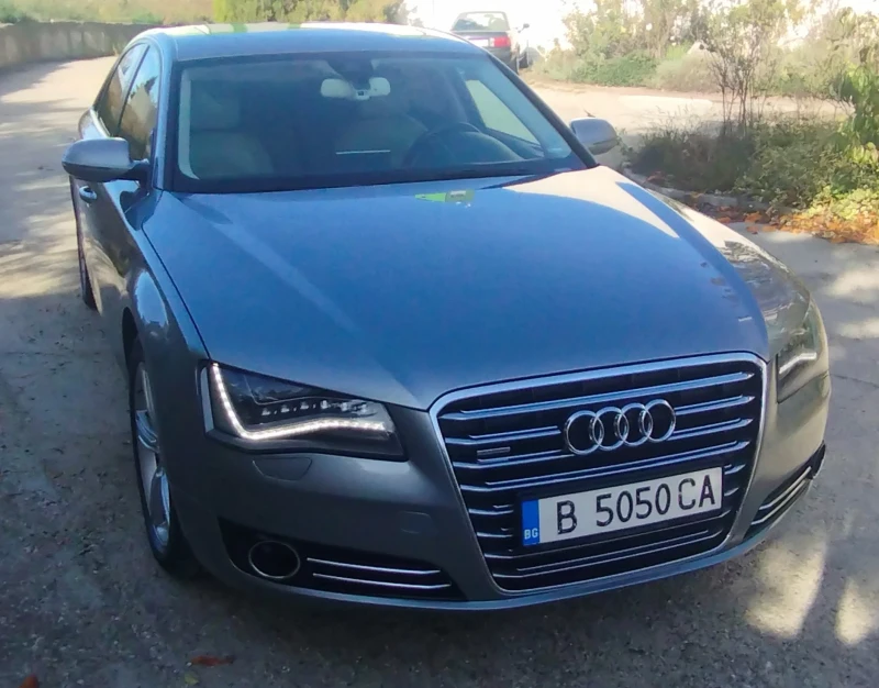 Audi A8 4.2-351кс