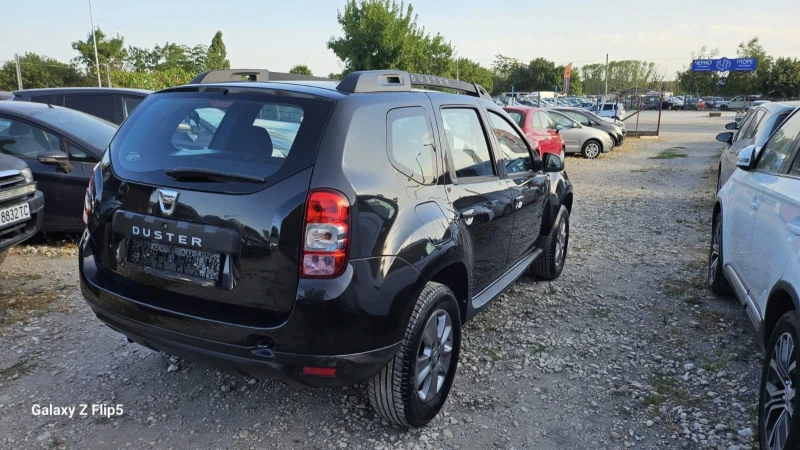 Dacia Duster 1.6i-LPG, снимка 4 - Автомобили и джипове - 51377333