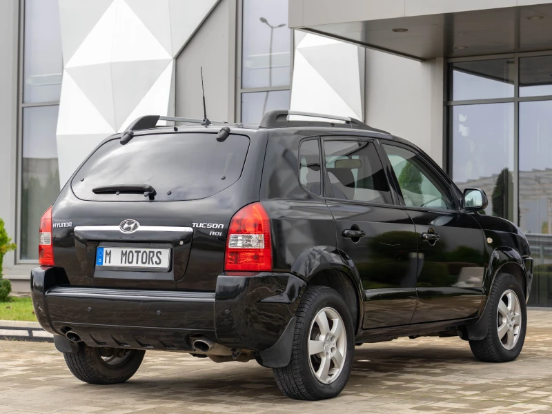 Hyundai Tucson 2.0 CRDI 4X4 Климатик, снимка 7 - Автомобили и джипове - 52436286