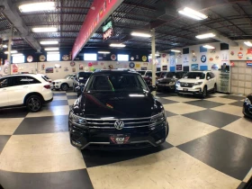 VW Tiguan * HIGHLINE AWD LEATHER PANO/ROOF NAVI B/SPOT CAMER | Mobile.bg    2