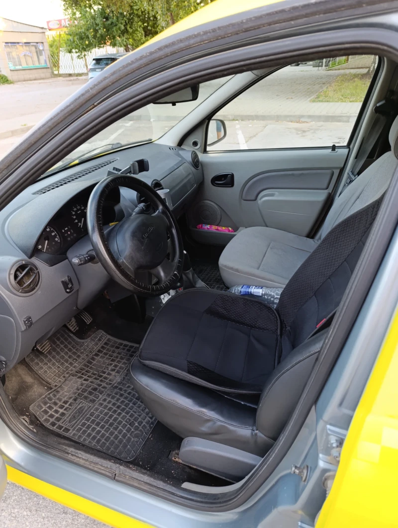 Dacia Logan 1.6MPl, снимка 5 - Автомобили и джипове - 52656361