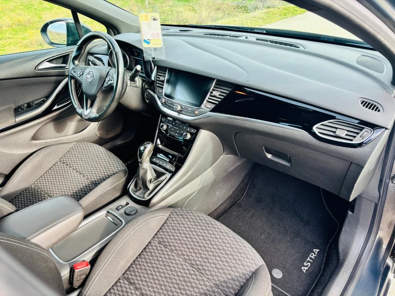 Opel Astra 1.4T-125ks., снимка 14 - Автомобили и джипове - 52554896