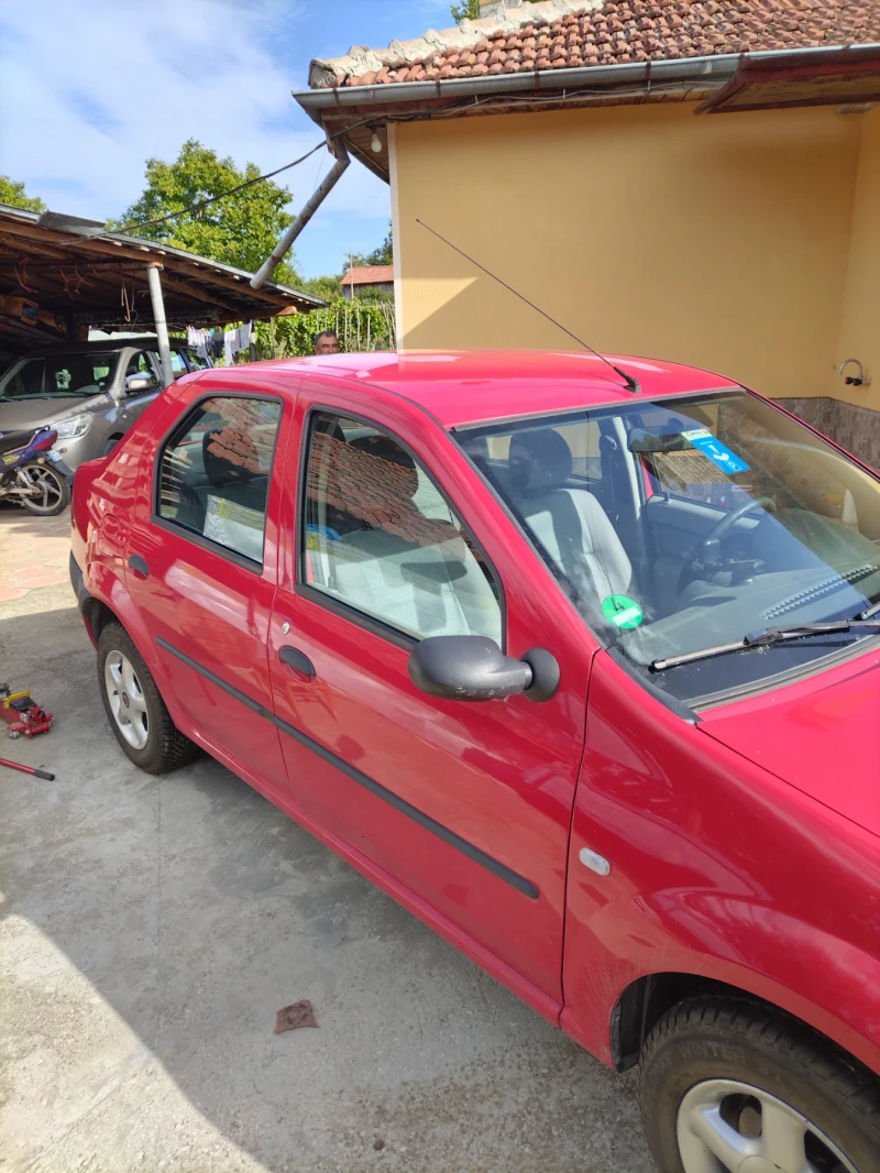 Dacia Logan, снимка 5 - Автомобили и джипове - 52414771