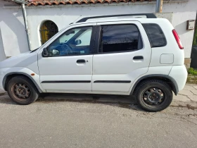 Suzuki Ignis 1.3i 16V 98 К.С, снимка 12