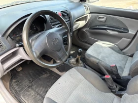 Kia Picanto 1.1 65 к.с., снимка 8
