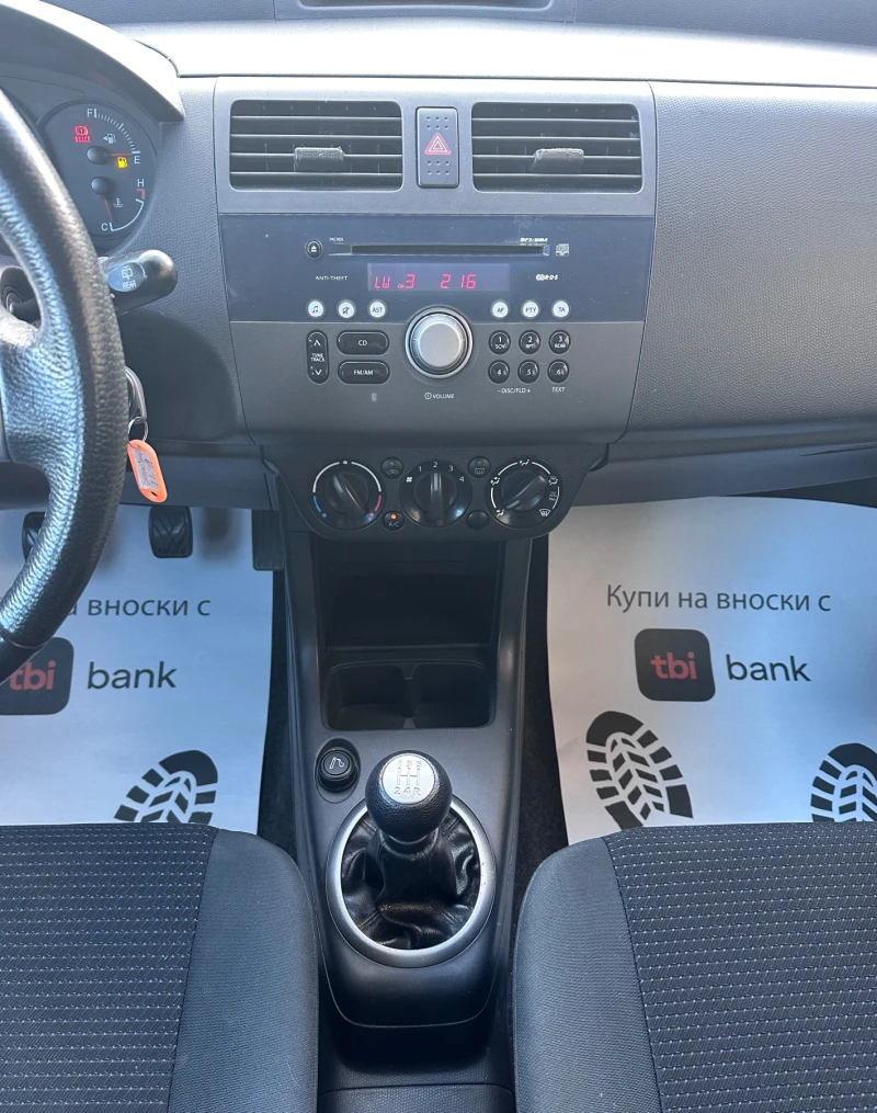 Suzuki Swift 1.3i - КЛИМАТИК - РЕАЛНИ КИЛОМЕТРИ, снимка 13 - Автомобили и джипове - 51996859