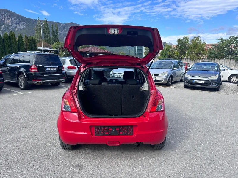 Suzuki Swift 1.3i - КЛИМАТИК - РЕАЛНИ КИЛОМЕТРИ, снимка 17 - Автомобили и джипове - 51996859