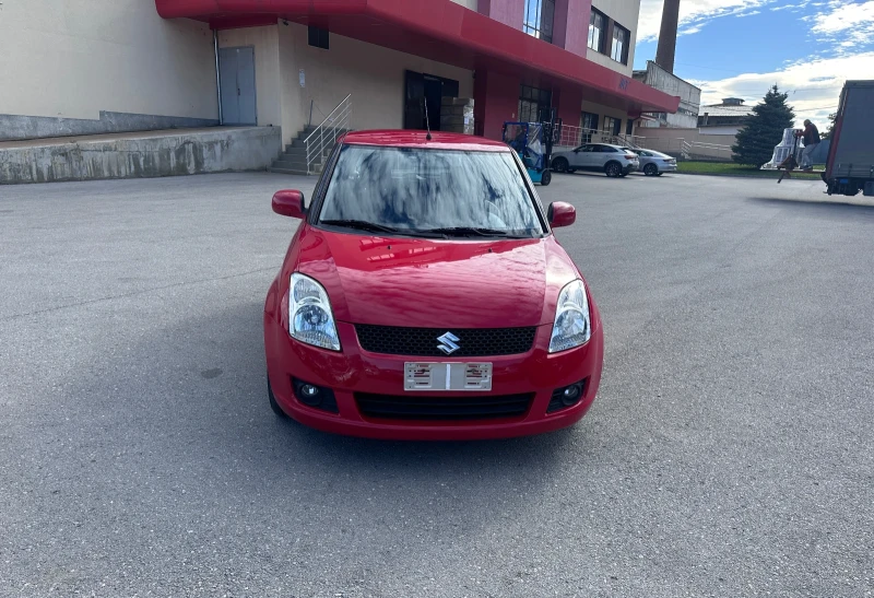 Suzuki Swift 1.3i - КЛИМАТИК - РЕАЛНИ КИЛОМЕТРИ, снимка 2 - Автомобили и джипове - 51996859