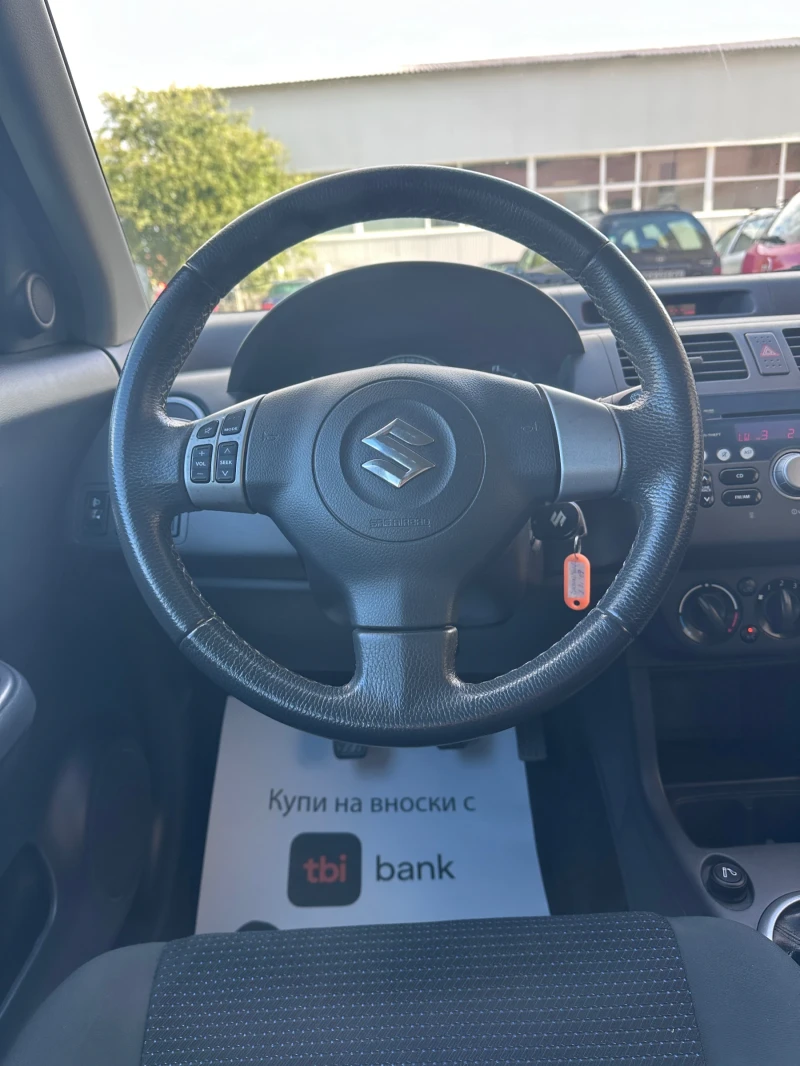 Suzuki Swift 1.3i - КЛИМАТИК - РЕАЛНИ КИЛОМЕТРИ, снимка 12 - Автомобили и джипове - 51996859